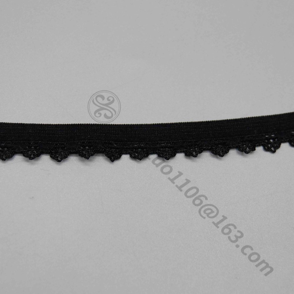 Detailed view of 1.1 cm wide black elastic webbing trim with minimalist lines enhanced by delicate lace wave edging for elegant detailing; soft and flexible, a bestseller for wholesale sewing in garments, underwear borders, and versatile DIY clothing embellishments.
