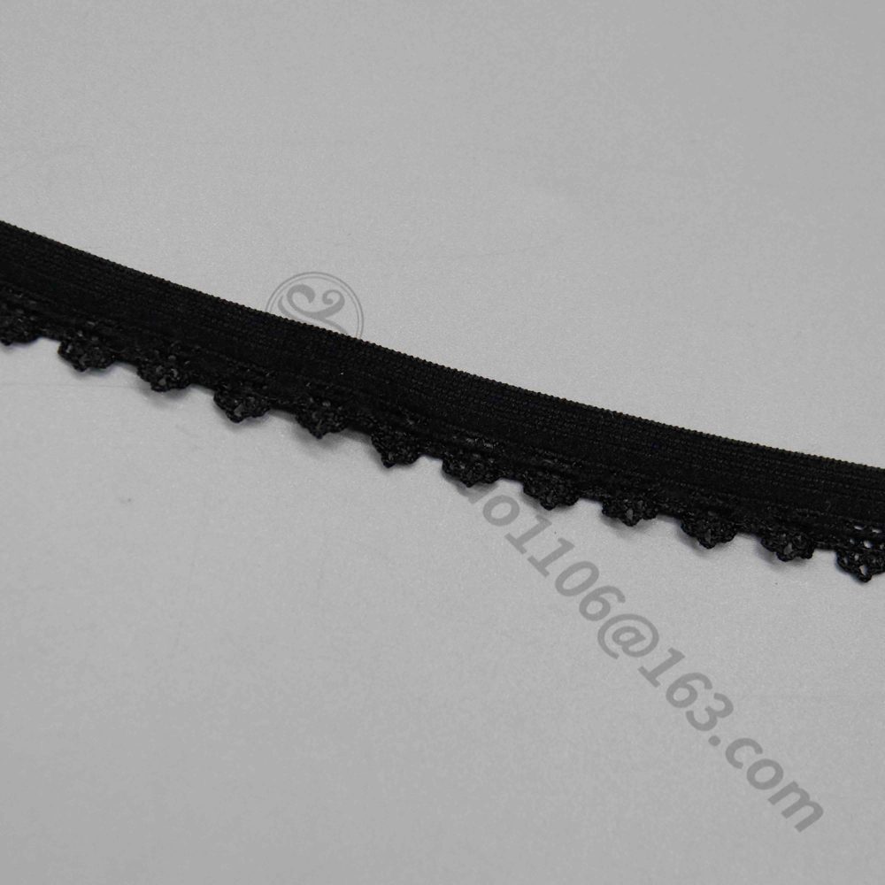 Sophisticated display of 1.1 cm black elastic lace webbing trim showcasing smooth, uncomplicated lines with fine lace accents forming small wave patterns; durable stretch ensures comfort, suited for bulk orders in underwear, garment sewing, and handmade fashion items.