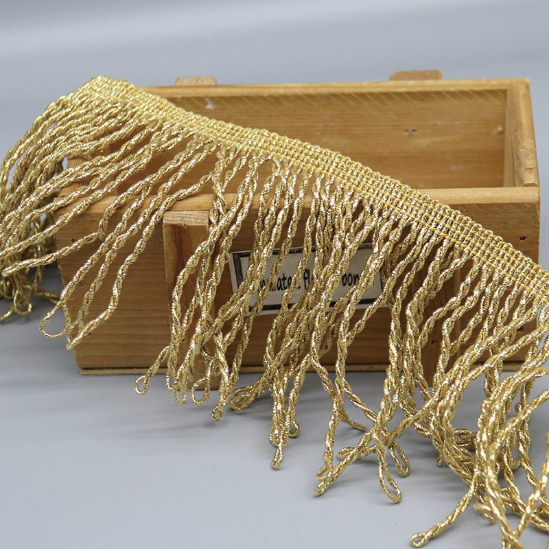 Golden Spiral Metallic Polyester Fringe Lace Trim 4.5cm on roll showing bulk availability