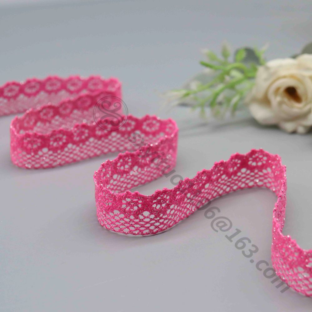 High-resolution detail showing the double scalloped flower chain borders on both sides.