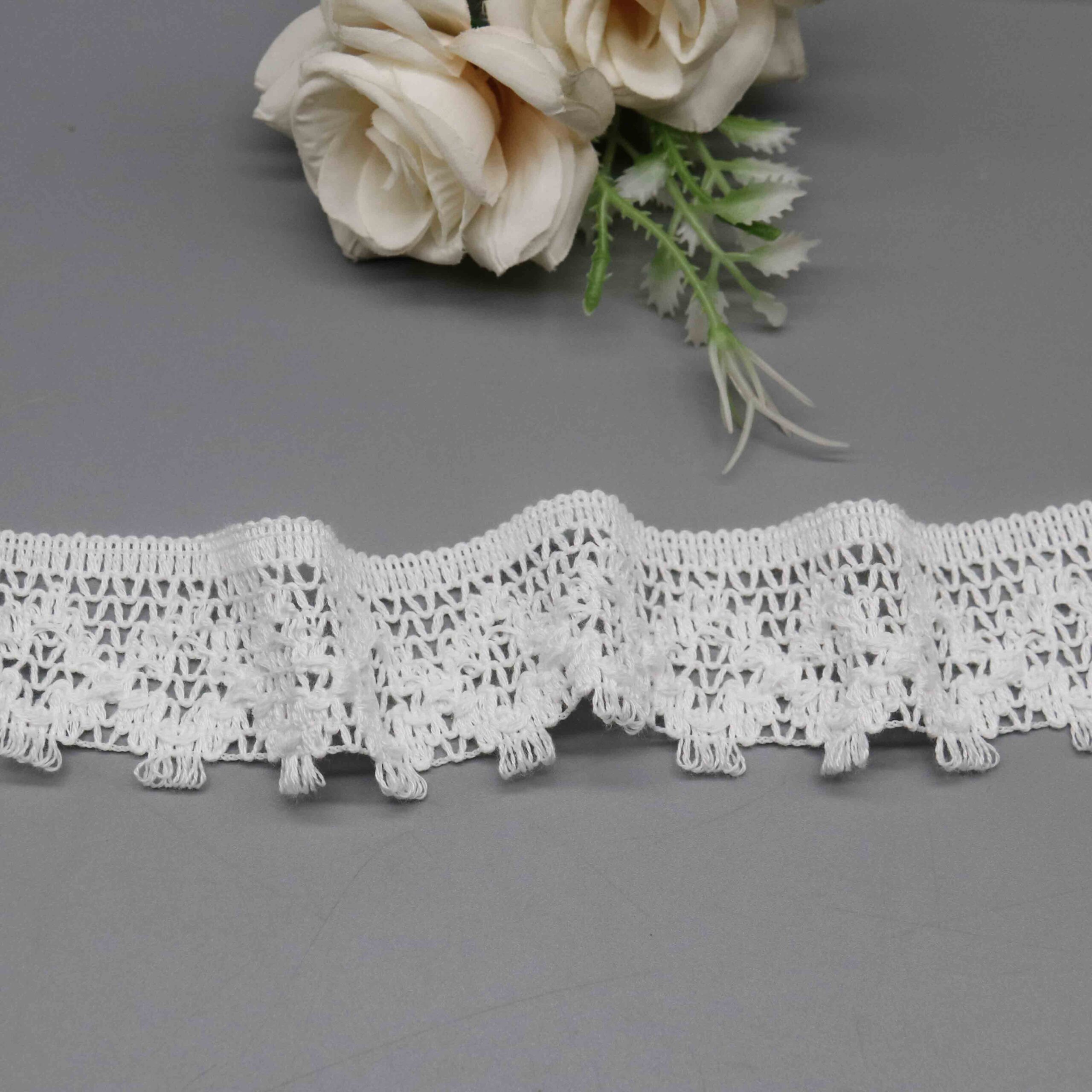 Macro close-up capturing intricate crochet-style construction and twisted thread craftsmanship.
