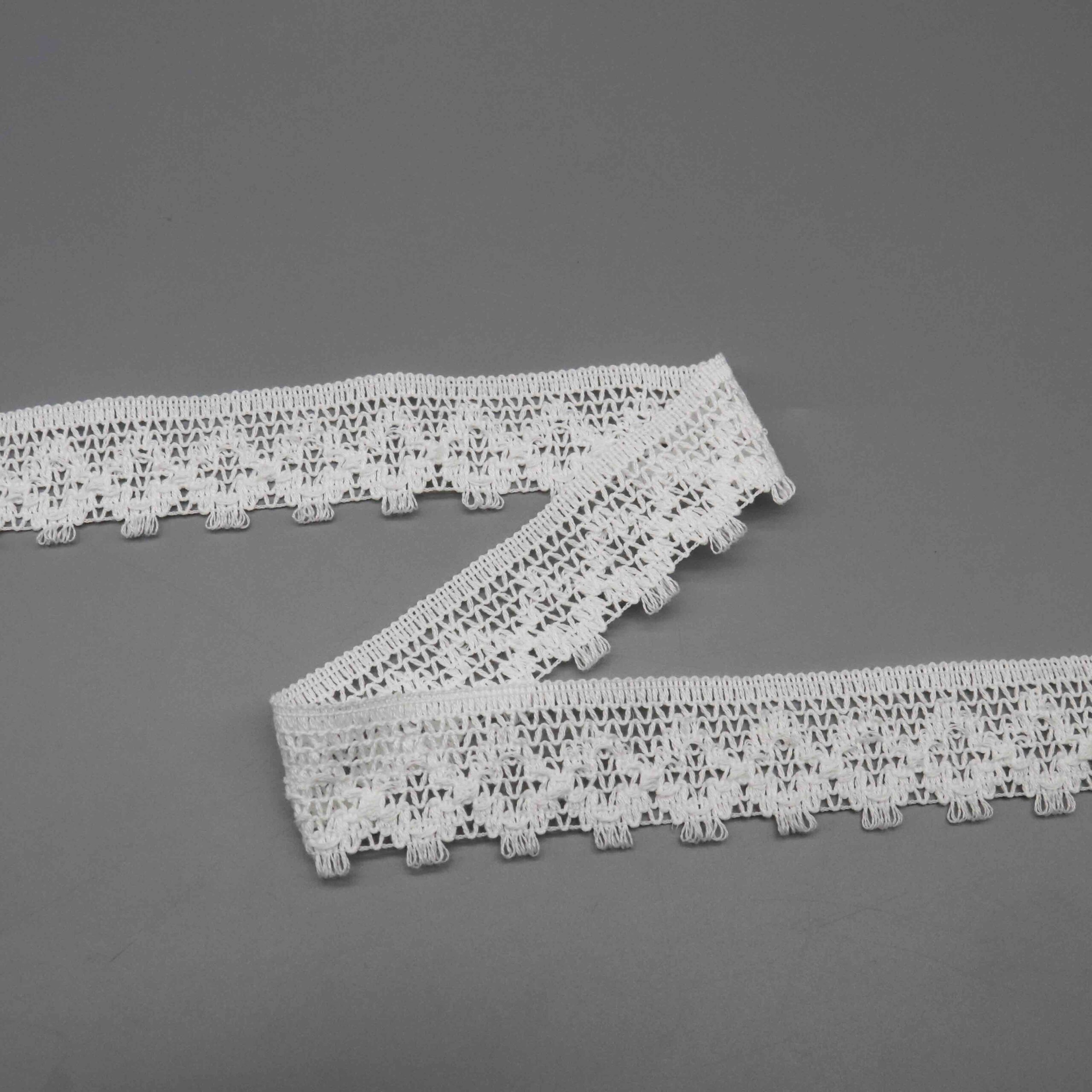 Angled view highlighting the matte yarn finish and soft tactile sensation of the fabric.