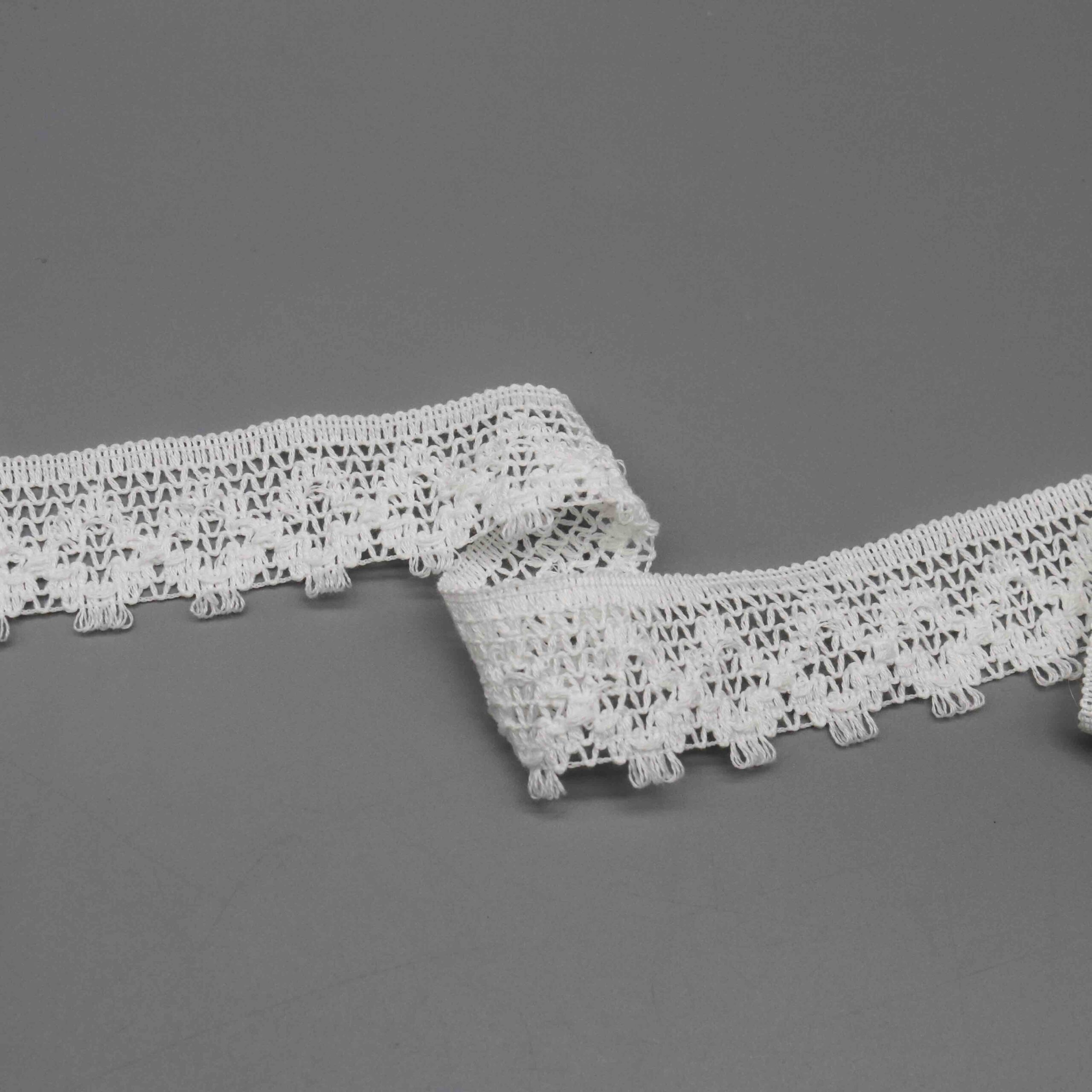 Backlit demonstration of the mesh density and see-through characteristics.