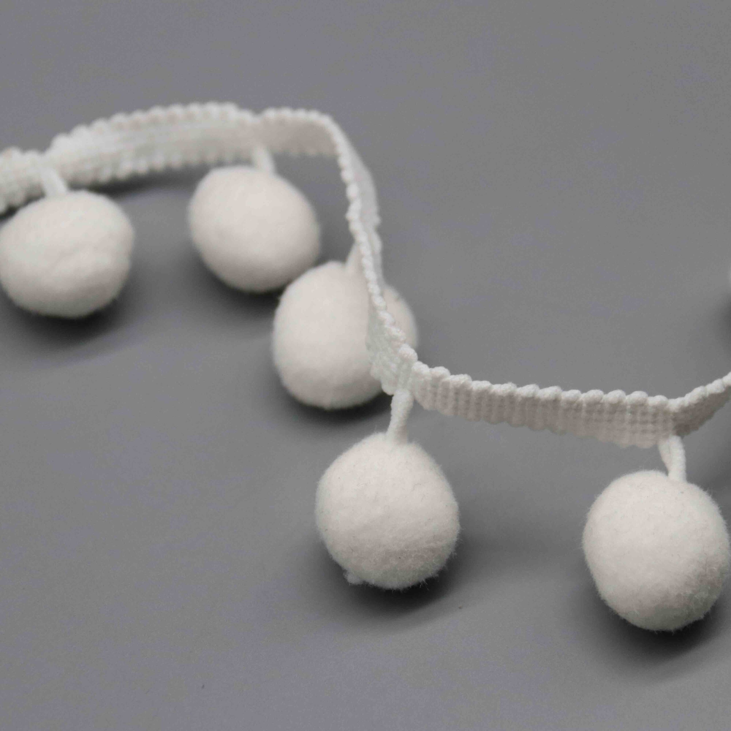 Scale demonstration showing the substantial ball diameter and visual impact.