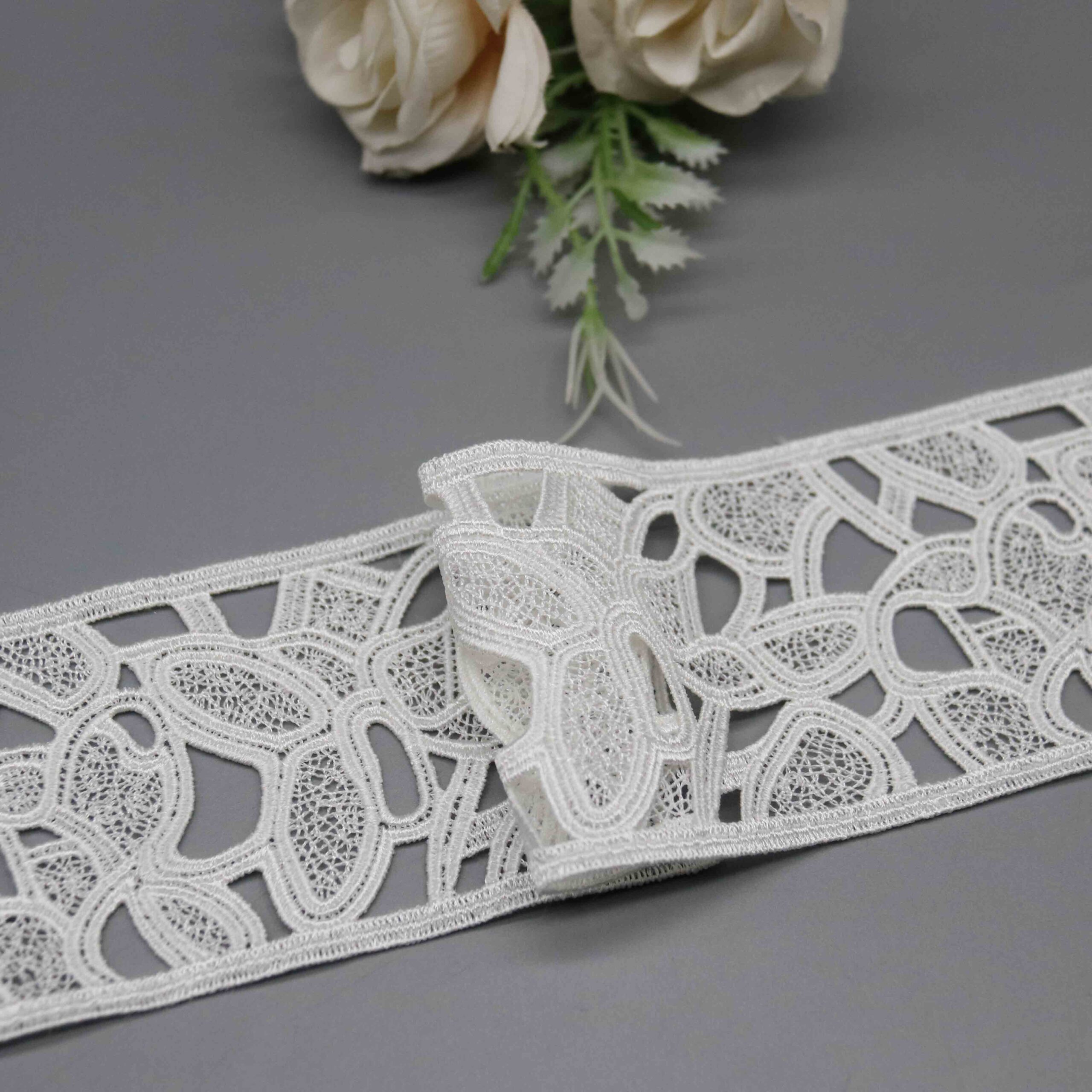 High-resolution focus on the clean edge construction and structured hemline quality.