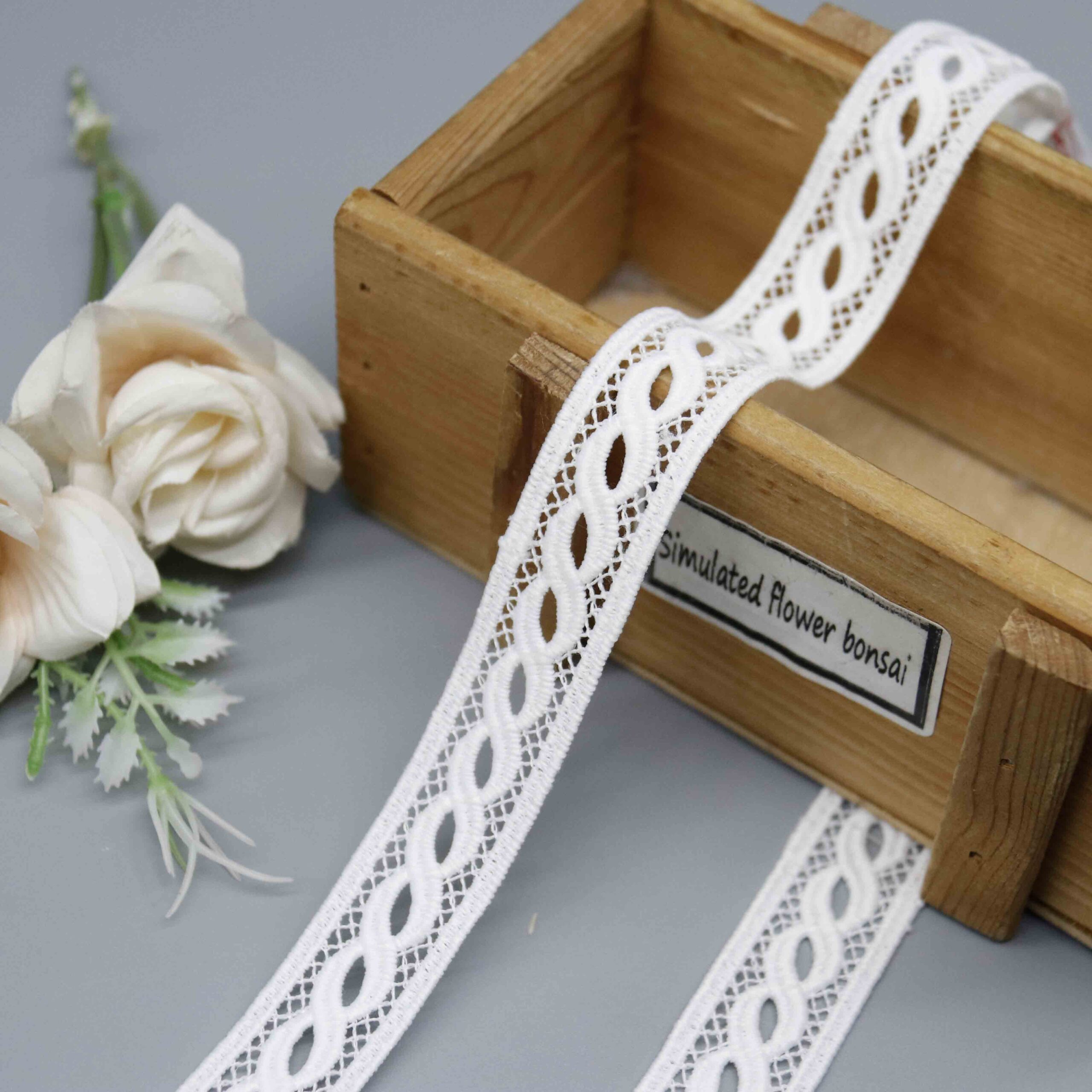 Front-facing shot showing the oval openwork pattern and silky polyester texture clearly.