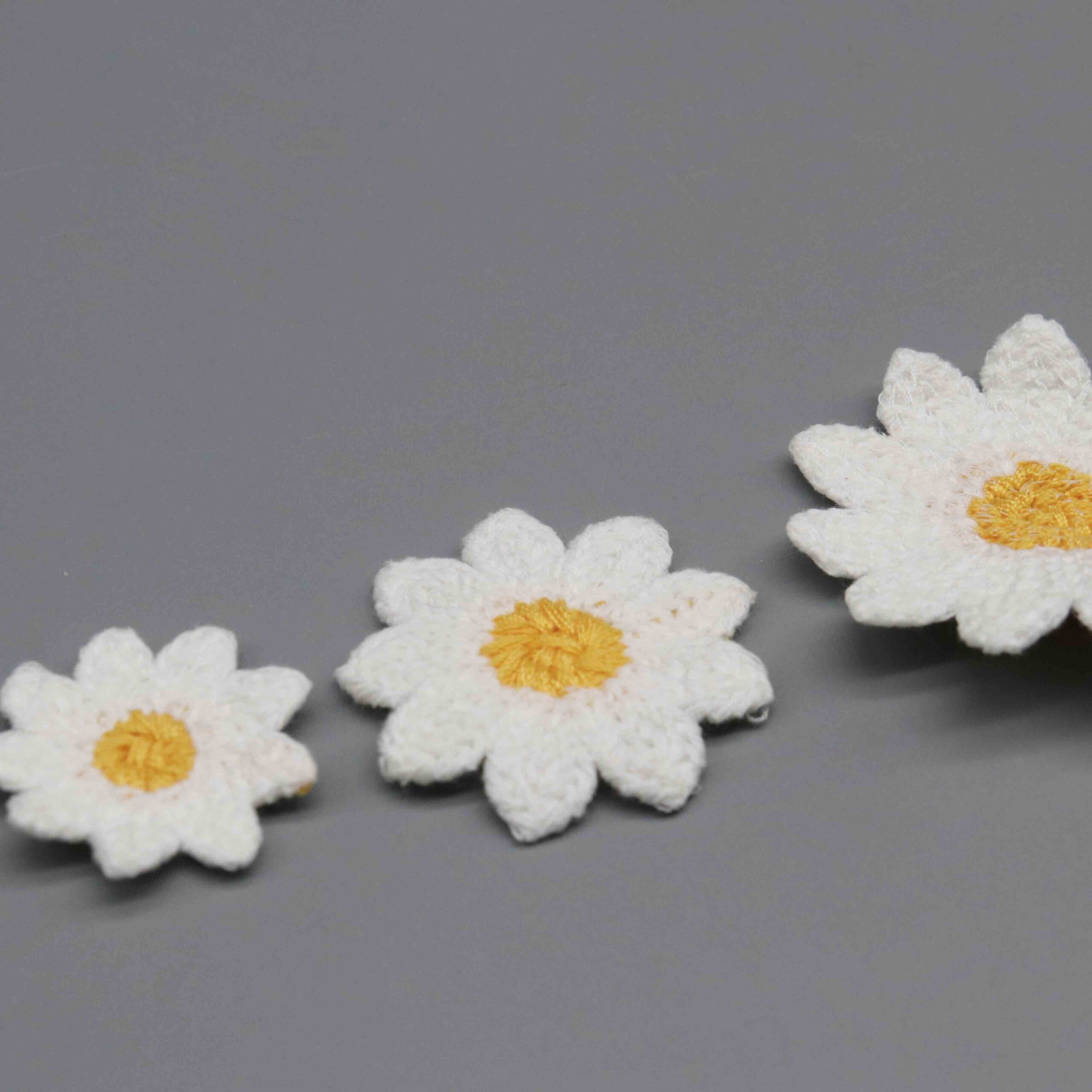 High-resolution focus on soft curved petal border construction and plush dimensional quality.