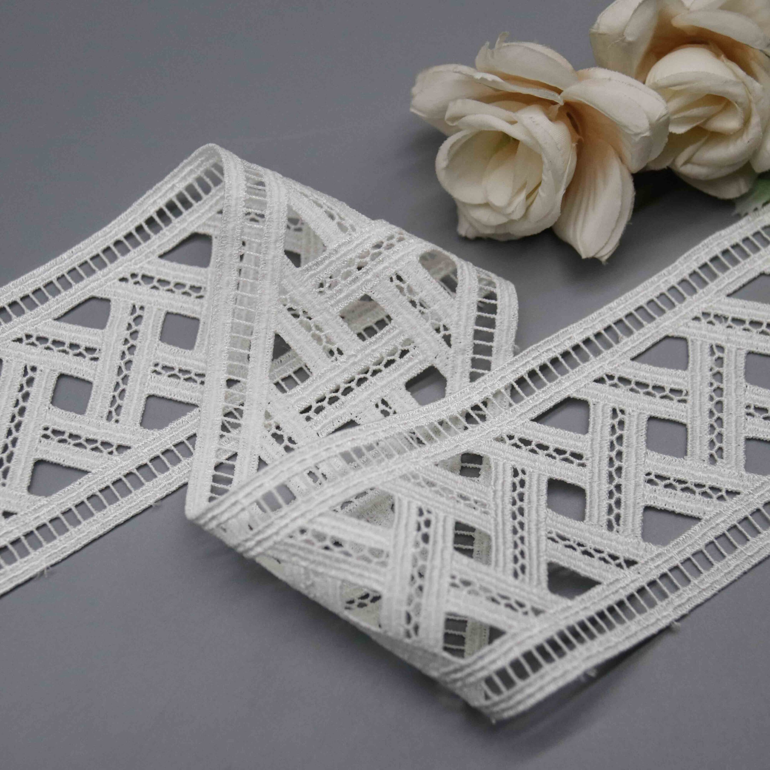 Angled view highlighting the lustrous sheen and soft tactile sensation of the decorative ribbon.