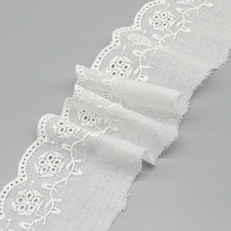 Wholesale premium cotton embroidered lace trims featuring elegant patterns, factory custom design support for fashion and bridal accessories.