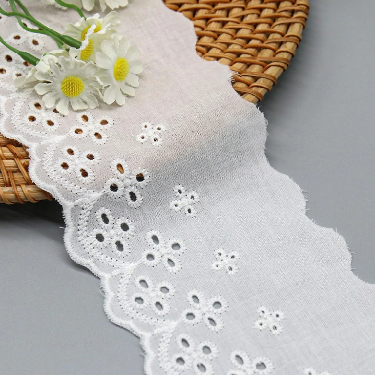 Soft and beautifully embroidered flower eyelet lace trim made of pure cotton, bestselling for adding charm to garments.