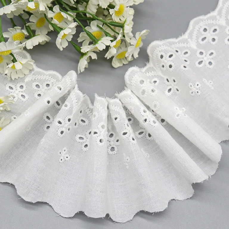 Trending pure cotton embroidered flower eyelet lace trim, highly suitable for adding elegant touches to high-quality garments.