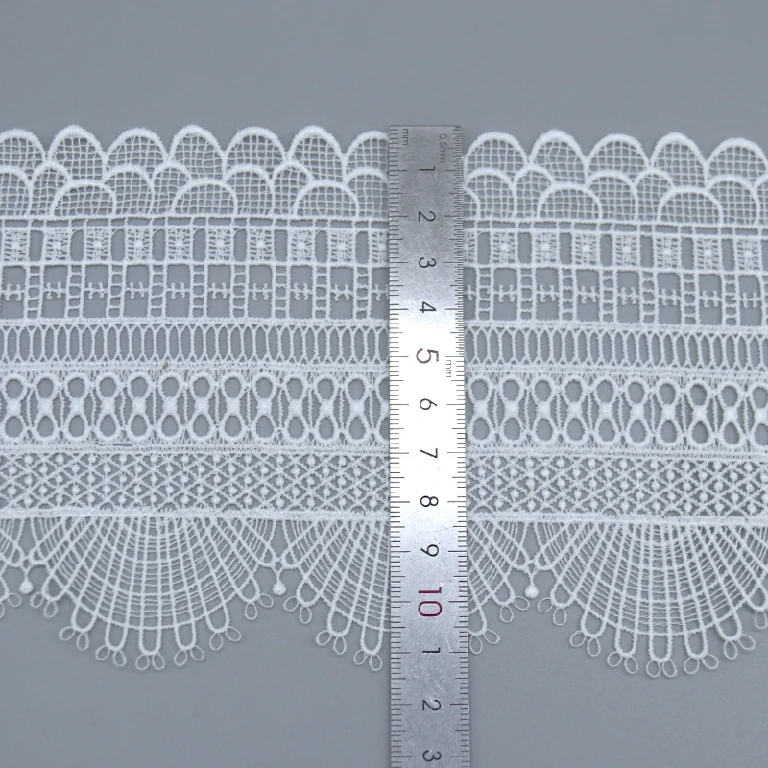 Intricate water soluble lace with elegant embroidery trimming