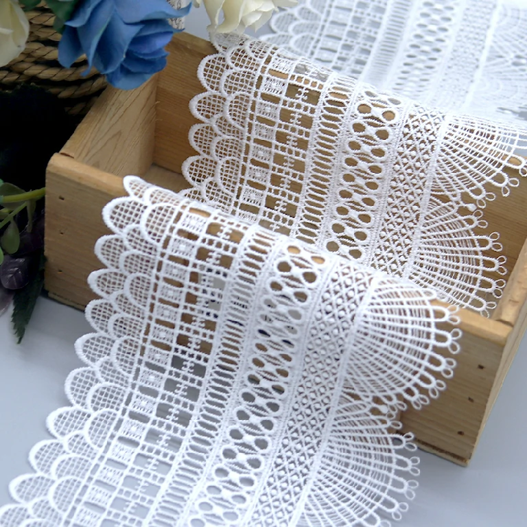 Water soluble lace embroidery trimming in white, bringing luxury and elegance to garment crafting